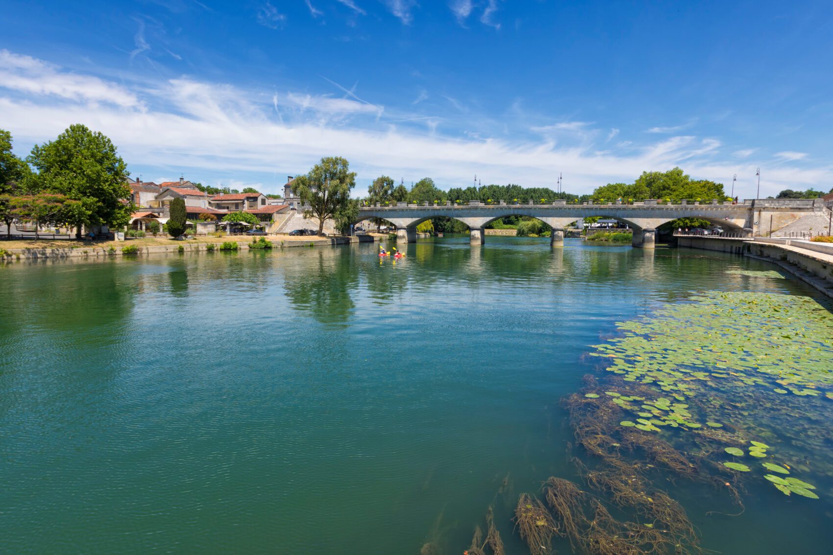 Charente river with Pont Neuf bridge at Cognac, France