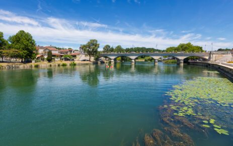 Charente river with Pont Neuf bridge at Cognac, France